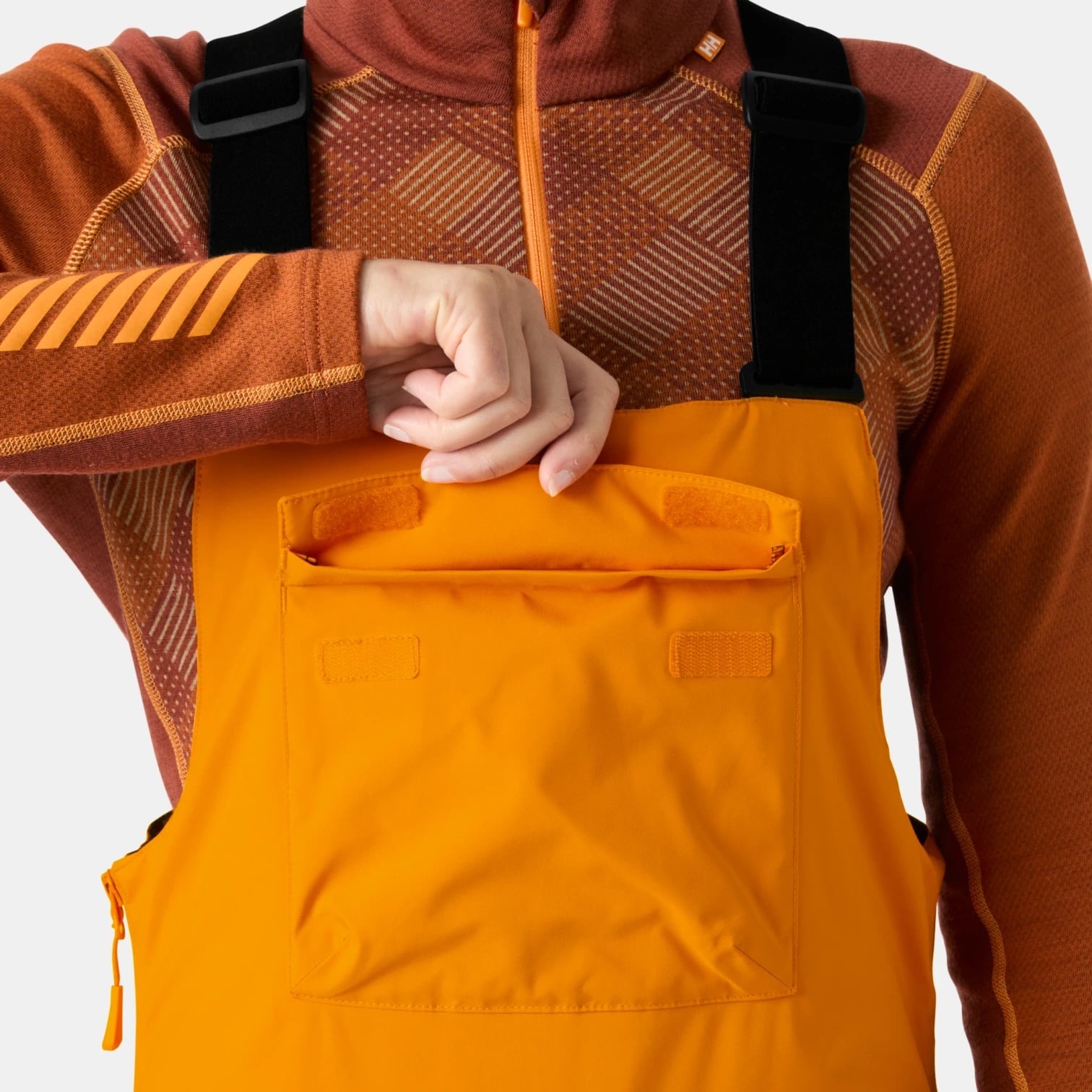 kamu-outdoors-product-w-legendary-insulated-bib-pant-naisten-lasketteluhousut-ignite-orange-17_processed.webp