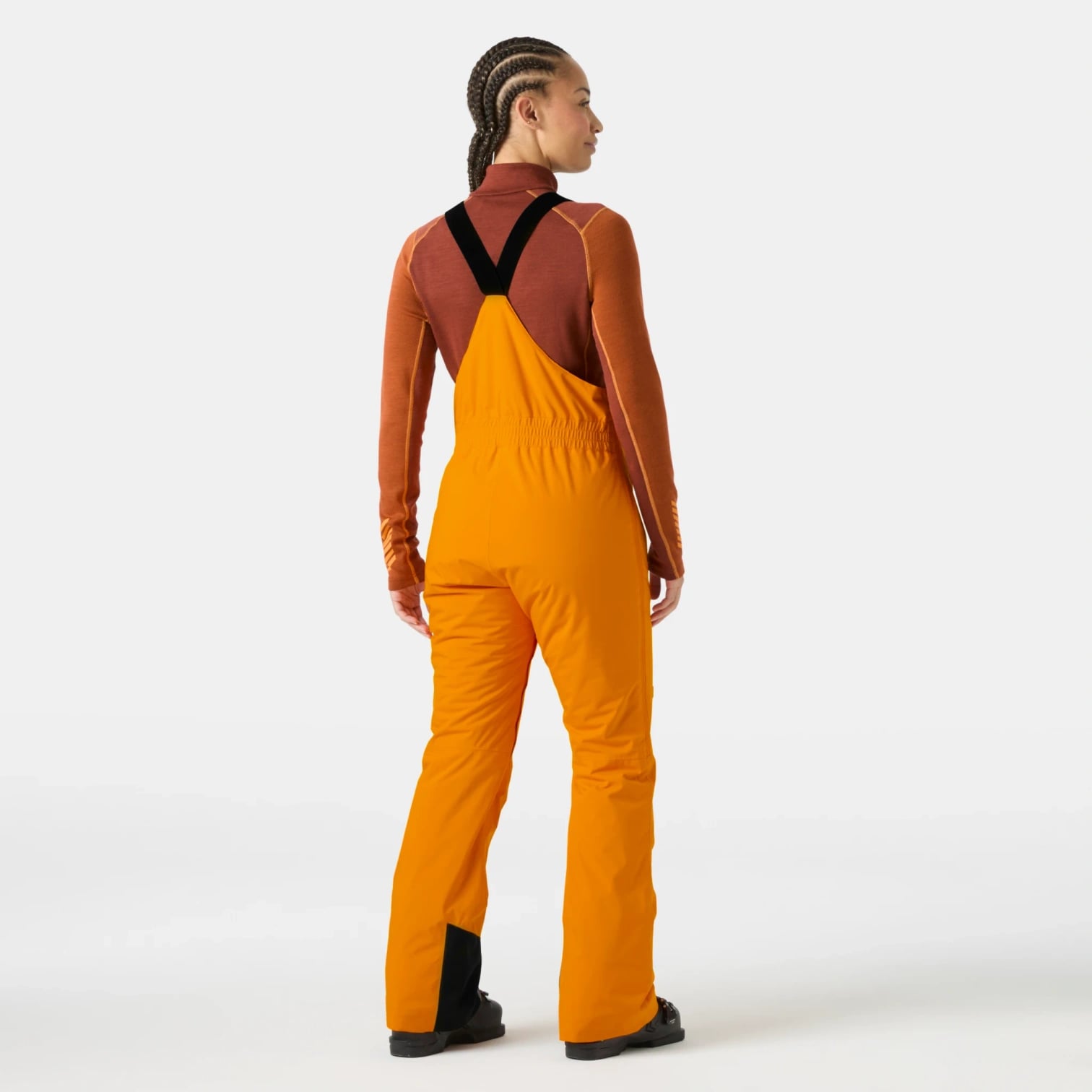 kamu-outdoors-product-w-legendary-insulated-bib-pant-naisten-lasketteluhousut-ignite-orange-16_processed.webp